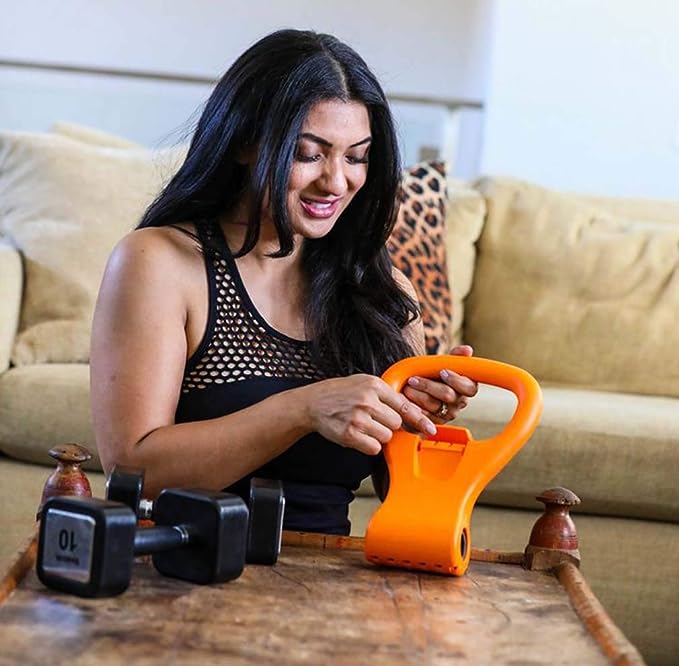 women using an adjustable kettle-grip